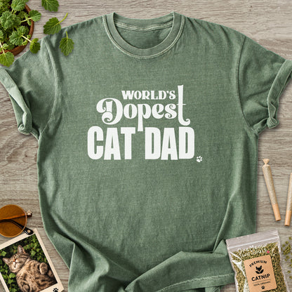 Moss colored Comfort Colors 1717 cotton T-shirt, featuring a "World's Dopest Cat Dad" funny cat design illustration. One Meow Two Souls brand.