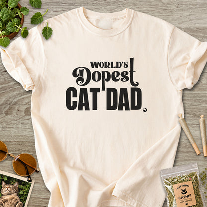 Ivory colored Comfort Colors 1717 cotton T-shirt, featuring a "World's Dopest Cat Dad" funny cat design illustration. One Meow Two Souls brand.
