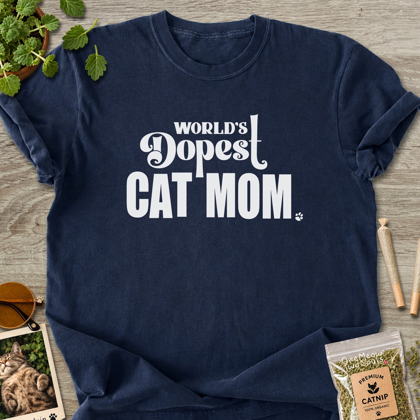 Navy colored Comfort Colors 1717 cotton T-shirt, featuring a "World's Dopest Cat Mom" funny cat design illustration. One Meow Two Souls brand.