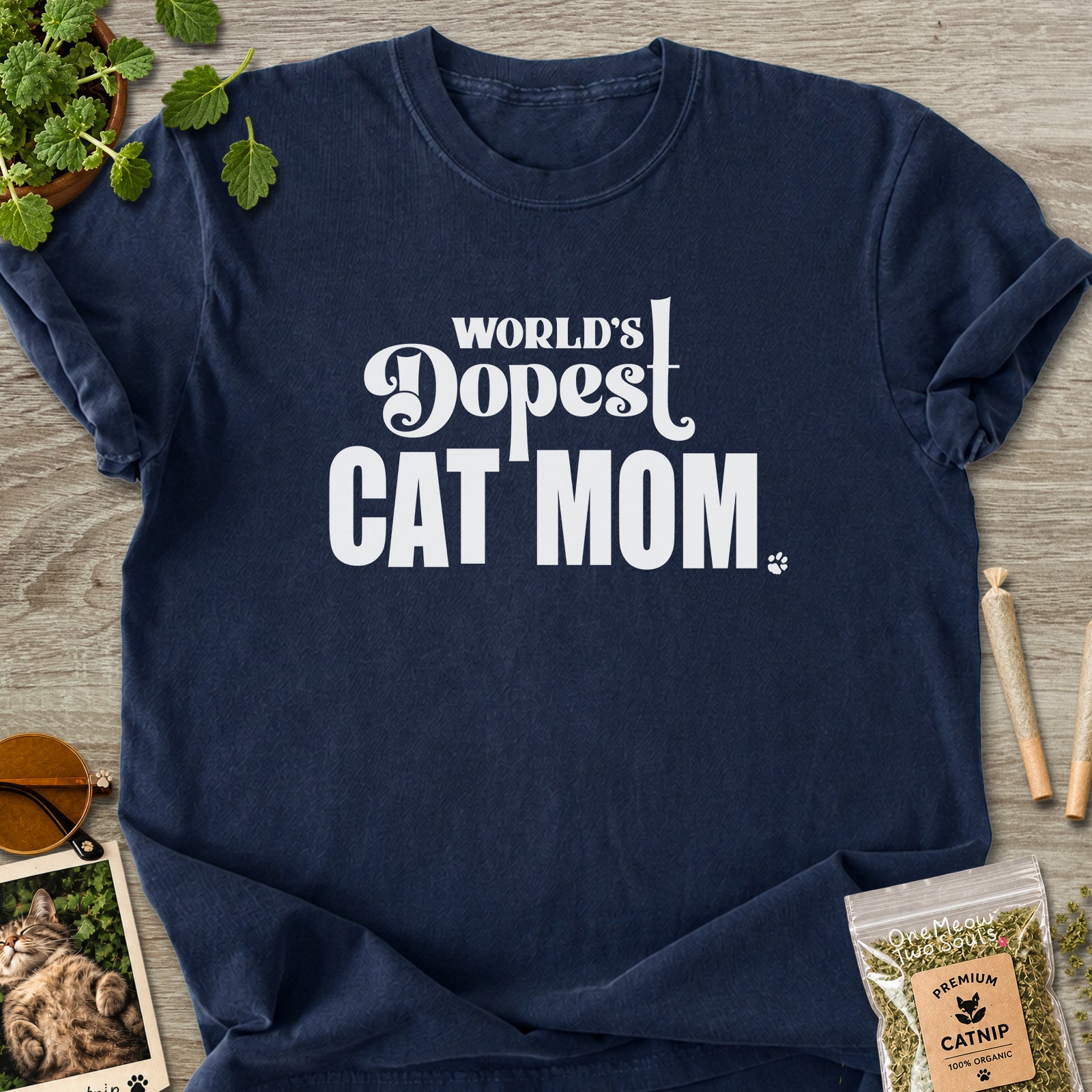 Navy colored Comfort Colors 1717 cotton T-shirt, featuring a "World's Dopest Cat Mom" funny cat design illustration. One Meow Two Souls brand.