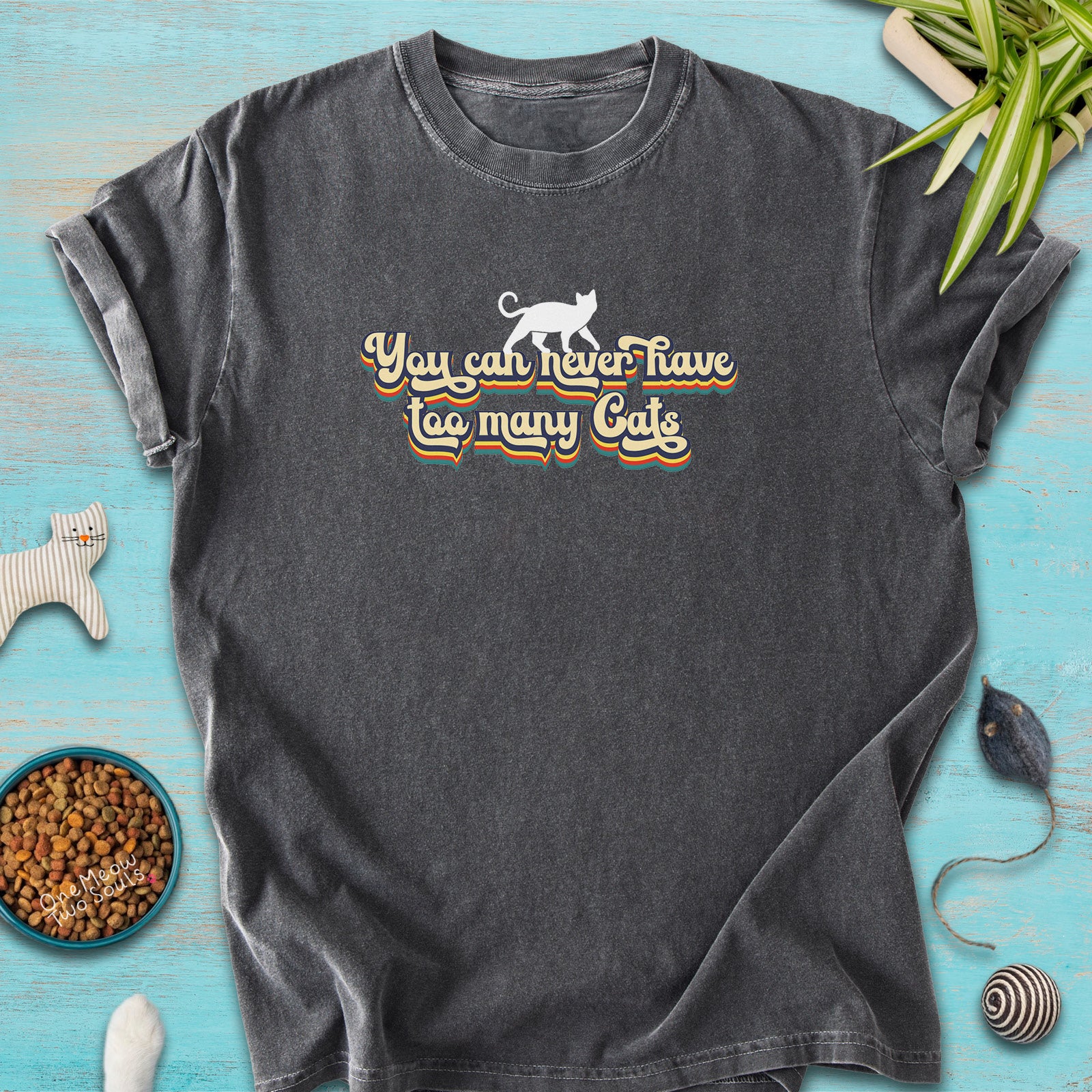 Pepper colored Comfort Colors 1717 cotton T-shirt, presenting a "You can never have too many cats" funny cat design. One Meow Two Souls brand.