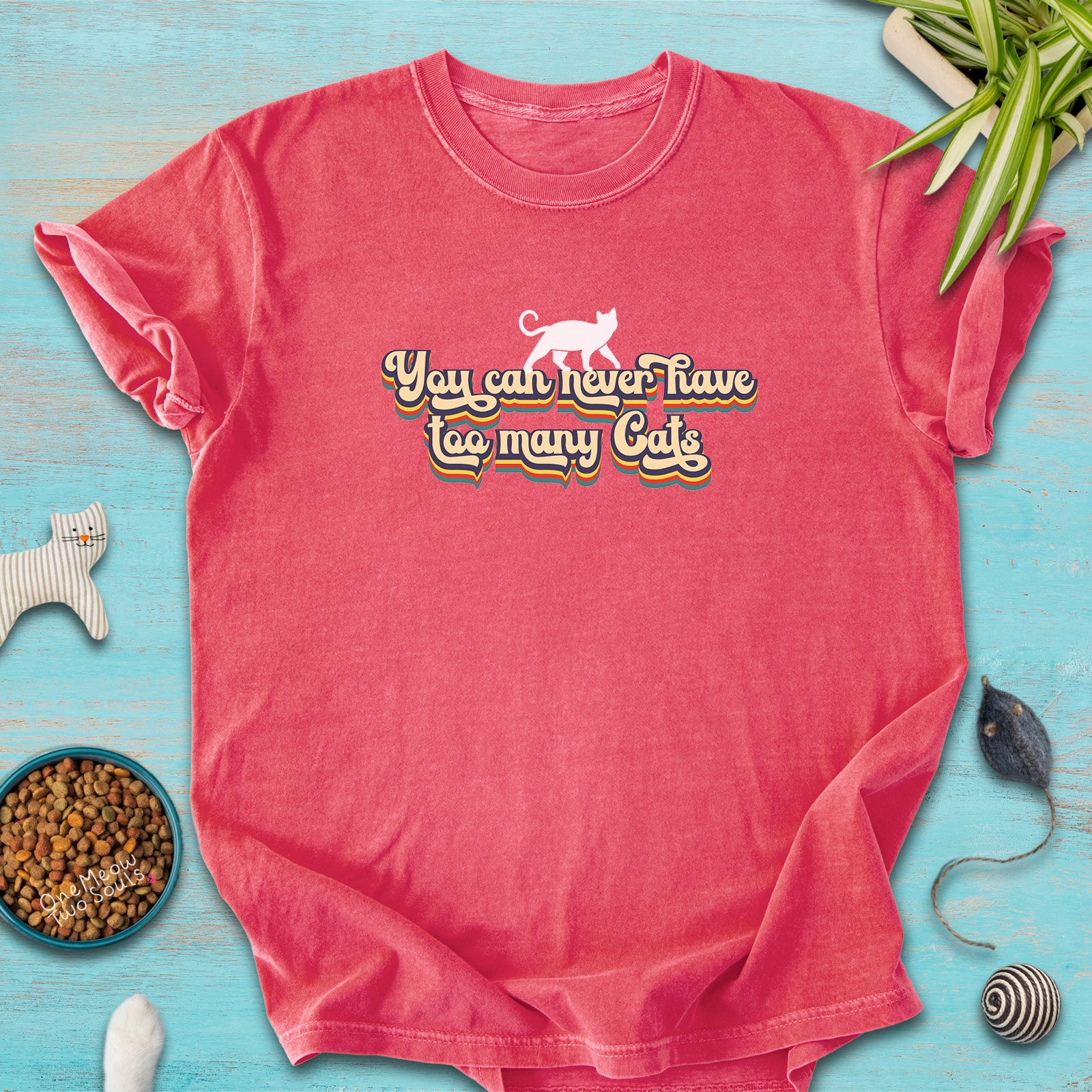 Watermelon colored Comfort Colors 1717 cotton T-shirt, presenting a "You can never have too many cats" funny cat design. One Meow Two Souls brand.