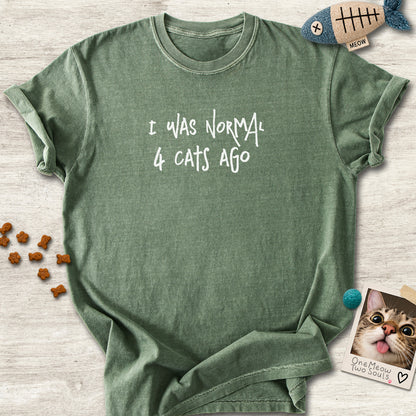 Moss colored Comfort Colors 1717 cotton T-shirt, featuring a "I was normal 4 cats ago" funny cat design illustration. One Meow Two Souls brand.
