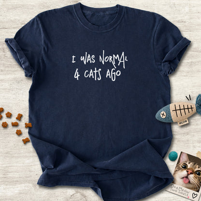 Navy colored Comfort Colors 1717 cotton T-shirt, featuring a "I was normal 4 cats ago" funny cat design illustration. One Meow Two Souls brand.