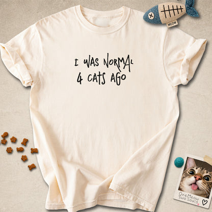 Ivory colored Comfort Colors 1717 cotton T-shirt, featuring a "I was normal 4 cats ago" funny cat design illustration. One Meow Two Souls brand.