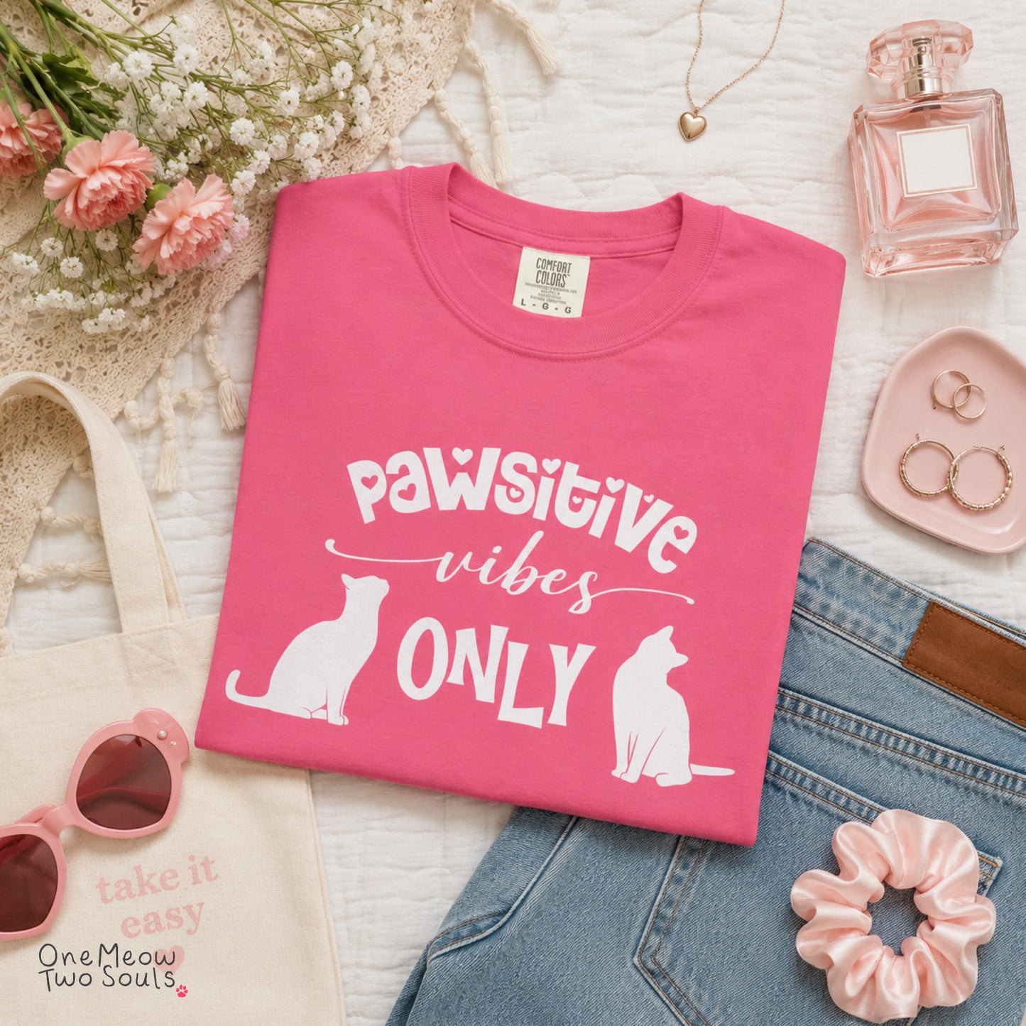 Crunchberry colored Comfort Colors 1717 cotton T-shirt, featuring a "Pawsitive Vibes Only" funny cat design illustration. One Meow Two Souls brand.