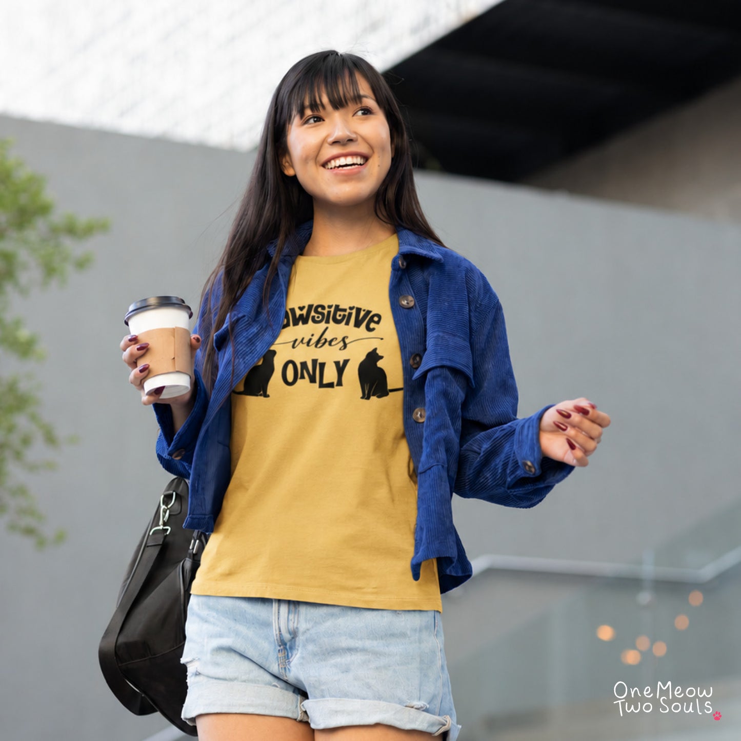 Mustard colored Comfort Colors 1717 cotton T-shirt, featuring a "Pawsitive Vibes Only" funny cat design illustration. One Meow Two Souls brand.