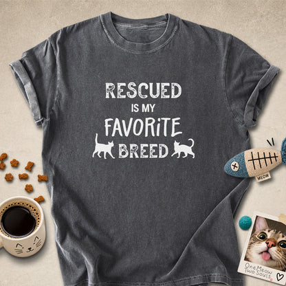 Pepper colored Comfort Colors 1717 cotton T-shirt, featuring a "Rescued is my favorite breed" funny cat design. One Meow Two Souls brand.